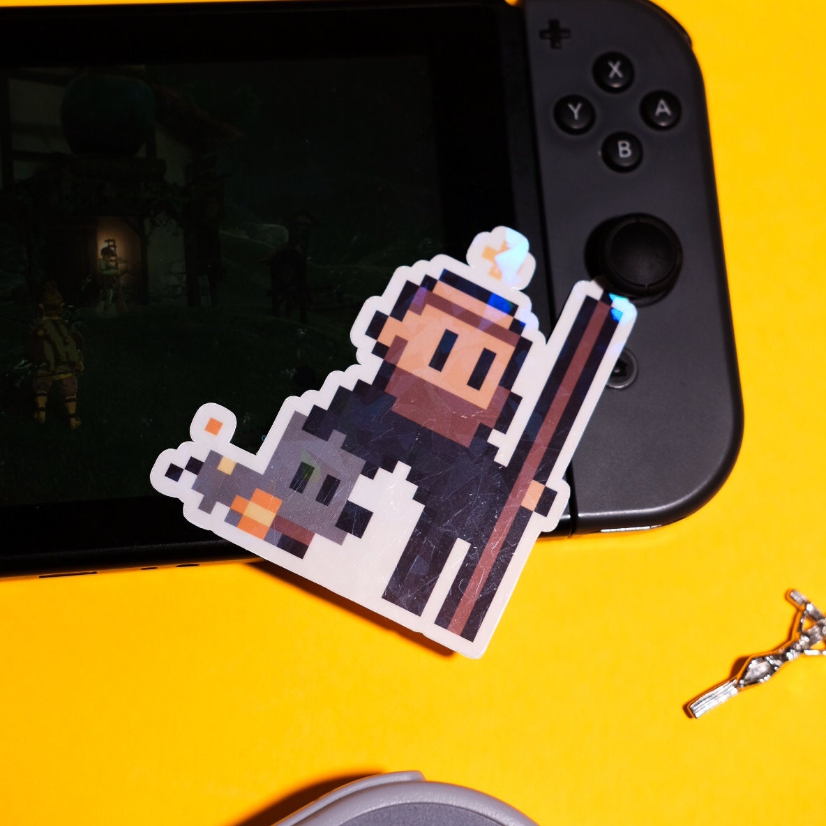 Glittery St. Dominic O.P. Video Game Sticker