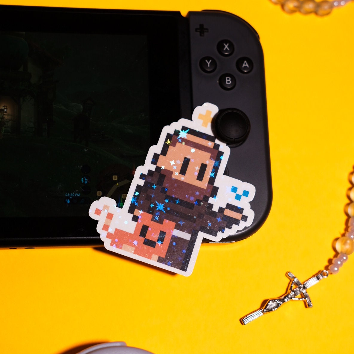 Glittery St. Francis of Assisi Video Game Sticker